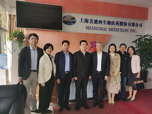 中国药科大学党委书记金能明与28圈首席执行官陈春麟博士